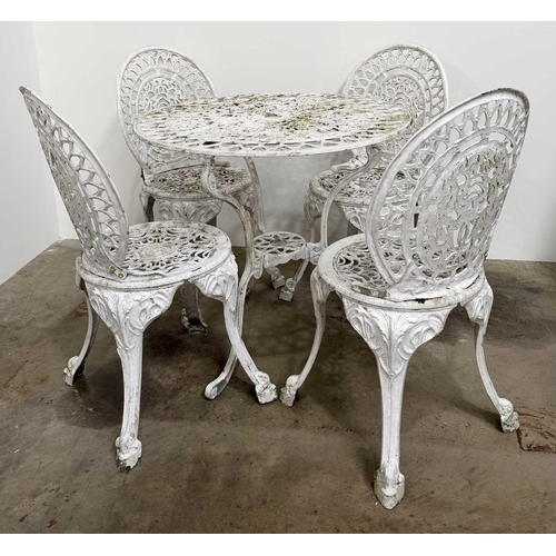 673 - Cast metal bistrot table and four chairs in the Victorian style with cast fretwork pattern, h: 70.5c... 