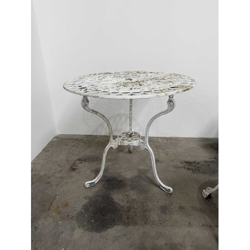 673 - Cast metal bistrot table and four chairs in the Victorian style with cast fretwork pattern, h: 70.5c... 