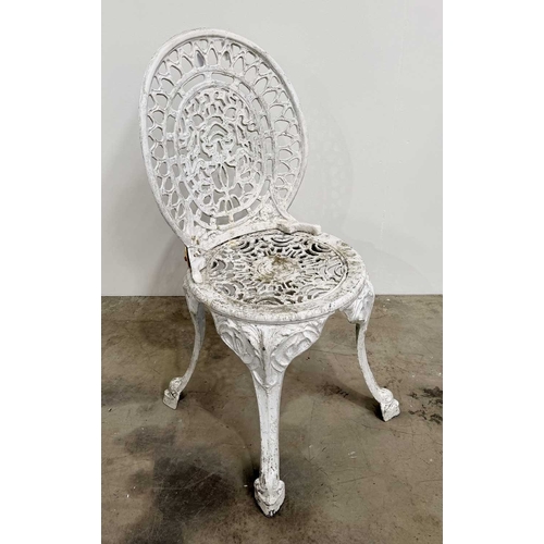 673 - Cast metal bistrot table and four chairs in the Victorian style with cast fretwork pattern, h: 70.5c... 