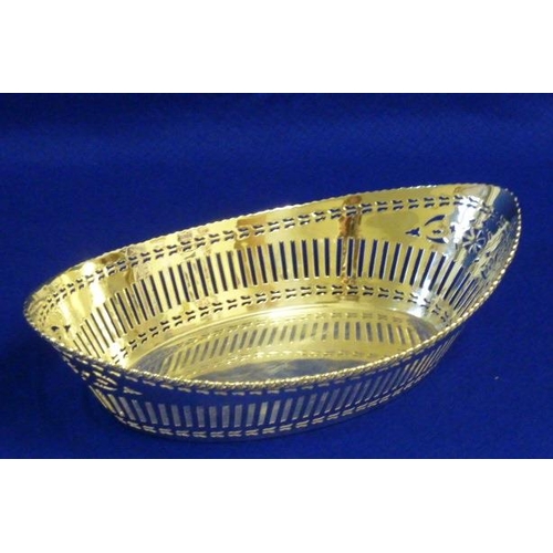 225 - A hallmarked silver boat-shaped Bowl, gadrooned edge, reticulated sides, 30cm wide, assayed Chester ... 