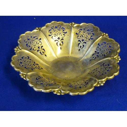 227 - A hallmarked silver flower head-shaped Dish with petal shaped reticulated panels, 24.5cm diameter, a... 