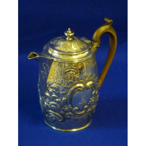 229 - A heavy hallmarked silver Hot Water Jug, high arched scrolling wooden handle (break to top) the main... 