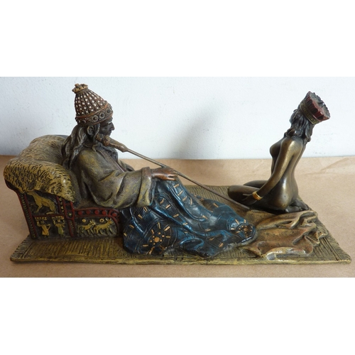 120 - A cold-painted bronze modelled in the style of Franz Bergmann; naked female servant kneeling before ... 