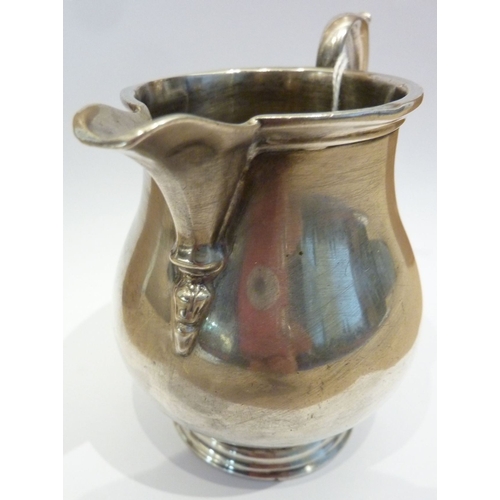 165 - A hallmarked silver milk/cream jug with Birmingham hallmarks