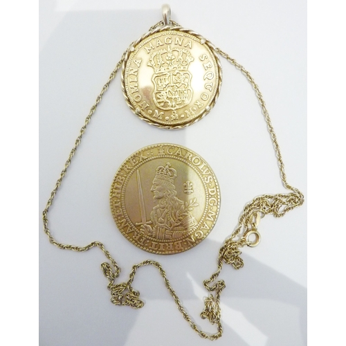 222 - A .925 silver coin pendant and chain together with a silver-gilt coin (boxed)