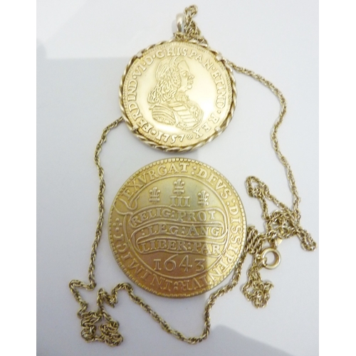 222 - A .925 silver coin pendant and chain together with a silver-gilt coin (boxed)