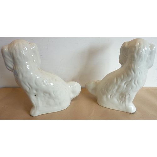 27 - A pair of large 19th century Staffordshire flat-back spaniels