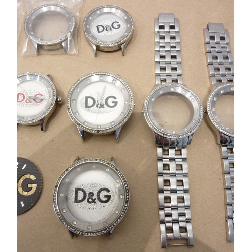 281 - A selection of various Dolce & Gabbana watch parts etc., to include bezels, cases and straps