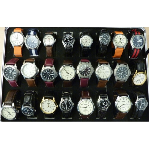 282 - A cased selection of 24 various Lorus wristwatches mostly with the day date at the 3 o'clock positio... 