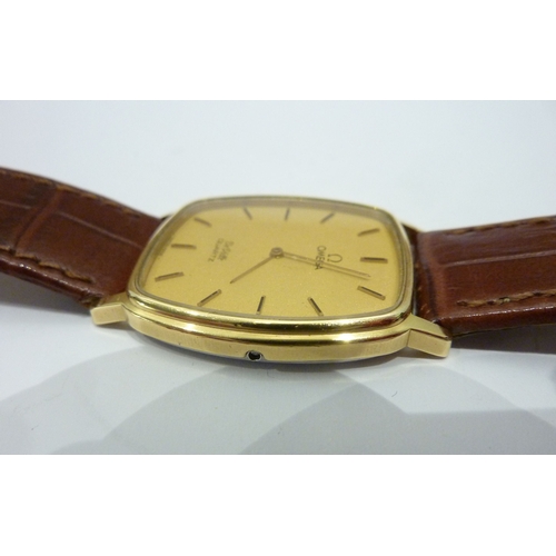 292 - A gentleman's Omega DeVille Dress Wristwatch, the gold coloured dial with baton markers, signed, on ... 