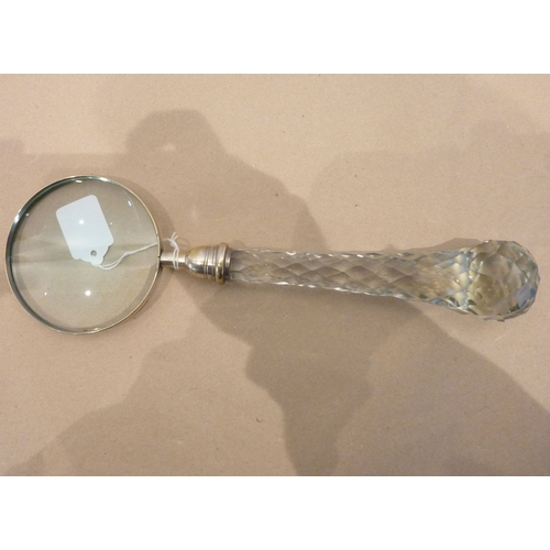 303 - A large cut-glass-handled magnifying glass