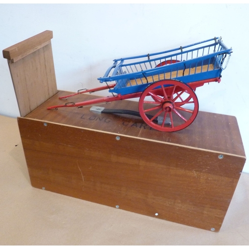 330 - A cased bespoke model of a long cart