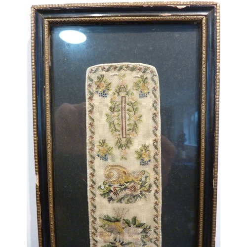 333 - A Hogarth framed and glazed needlework depicting urns, cornucopia and various flowers