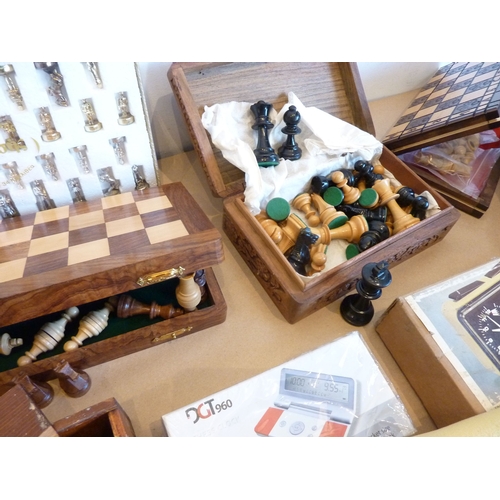 361 - A good selection of boxed chess pieces, various sized chess boards, travelling chess boards and othe... 