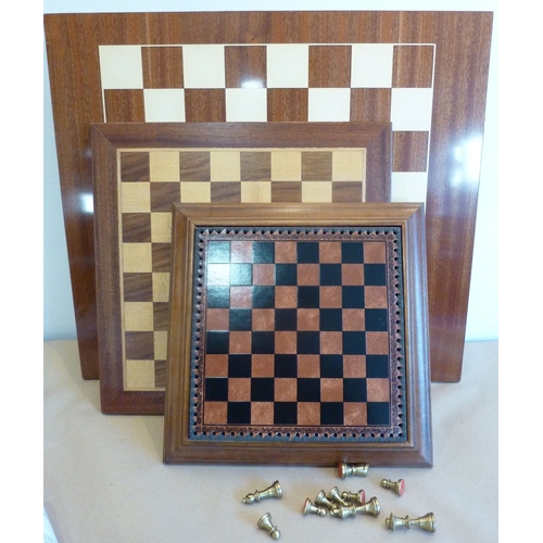 361 - A good selection of boxed chess pieces, various sized chess boards, travelling chess boards and othe... 