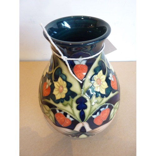 64 - A Moorcroft vase in the Strawberry Thief pattern