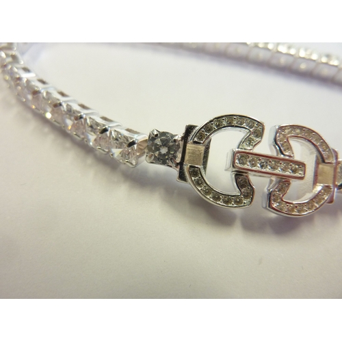 173 - A silver and zirconia bracelet