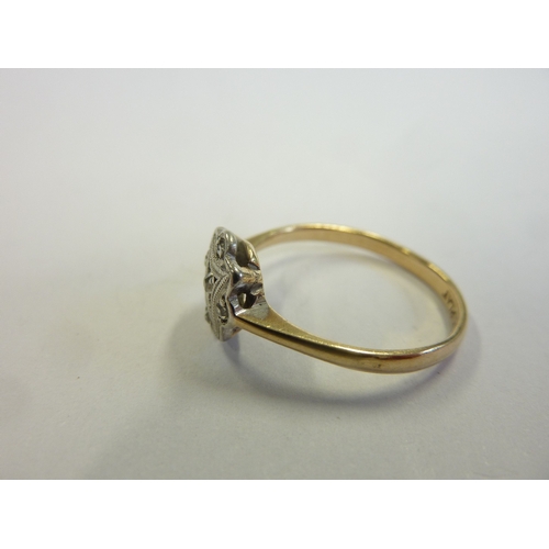 174 - An early 9-carat gold and platinum diamond ring