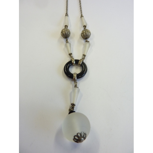 176 - A silver, onyx and crystal necklace