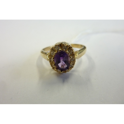 182 - A 9-carat gold stone-set cluster ring