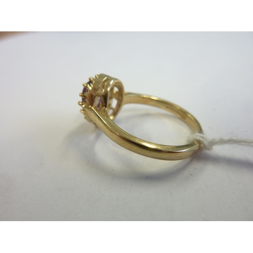 182 - A 9-carat gold stone-set cluster ring