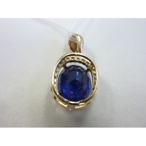 189 - A sapphire and diamond cluster pendant (matching the previous lot)