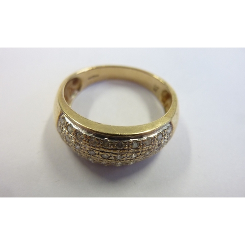 198 - A 9-carat gold multi-diamond set dress ring