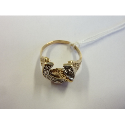 204 - A 9-carat gold horseshoe/horse-head ring