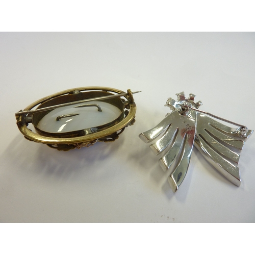 223 - An ornate Victorian mourning brooch together with a costume brooch marked Boucher (boxed)