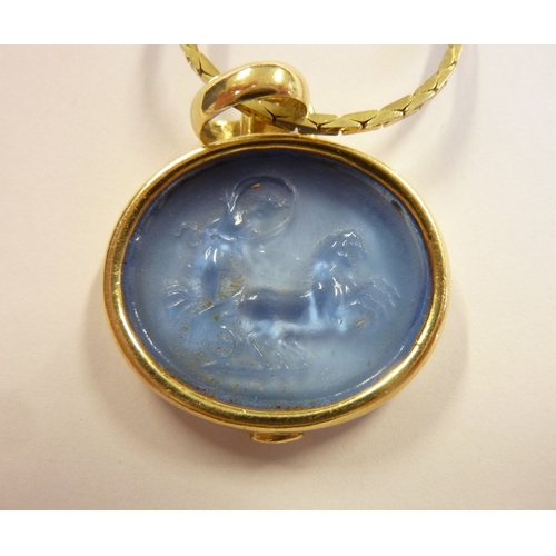 226 - An 18-carat gold-mounted lithophane intaglio pendant together with a gold-coloured neck chain