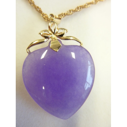 227 - A 14-carat gold-mounted heart-shaped lavender jade pendant together with a gold-coloured chain