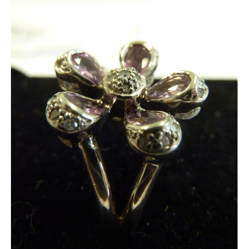 238 - A white gold, pink sapphire and diamond cluster ring