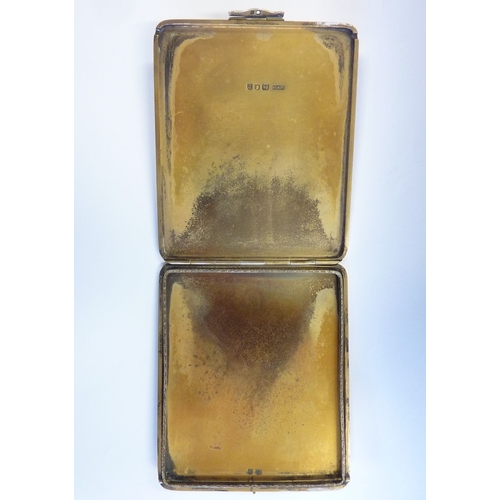 302 - A hallmarked Art Deco style heavy cigarette case (some wear), flip-over clasp and engine turning