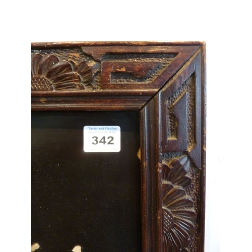 342 - A late 19th/early 20th century Chinese ivory inlaid lacquer plaque having ornate carved frame