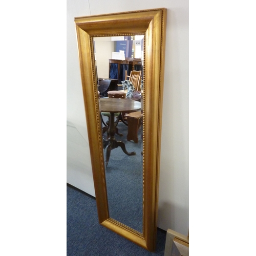 430 - a large gold framed wall hanging lounge/hallway mirror, the gilt beaded frame surrounding a hand-bev... 