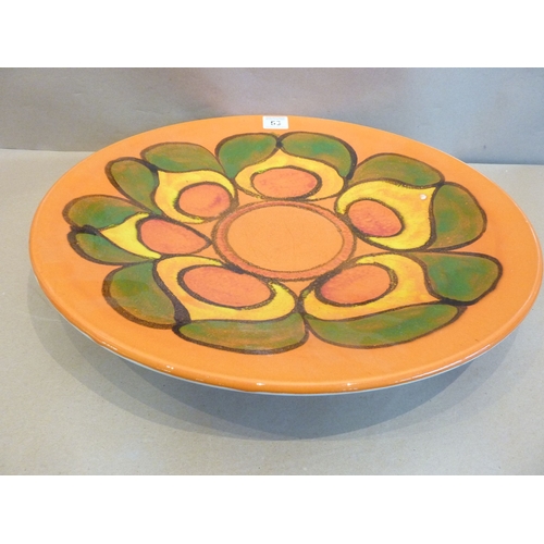 38 - A large 1950s/1960s Poole Pottery charger