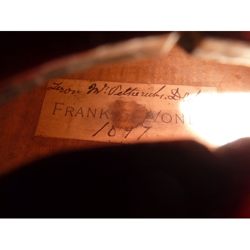 370 - An old violin with interior label for Frank Voney annotated with a name and dated 1897, together wit... 