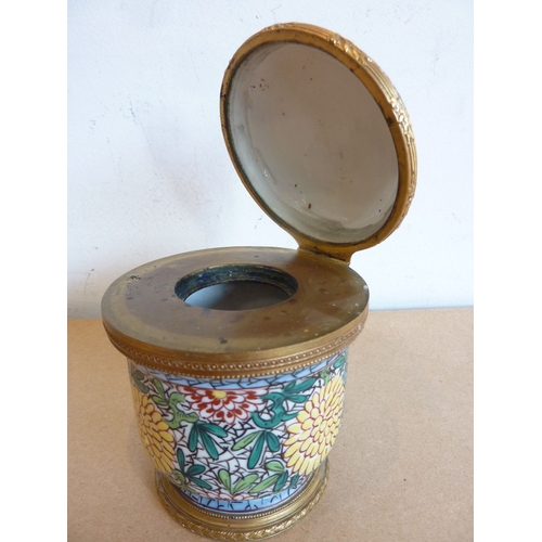 77 - A gilt-metal-mounted ceramic circular inkwell hand-decorated in enamels with chrysanthemums etc.