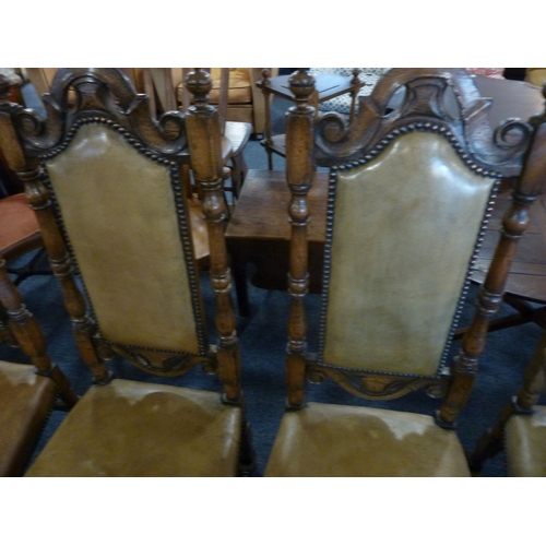 466 - A very good set of eight (6+2) carved oak and upholstered dining chairs; ornately scrolling pierced ... 