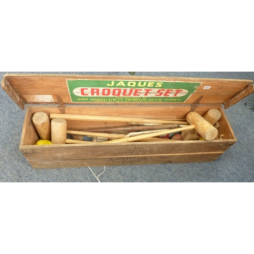 546 - A croquet set with mallets, hoops, balls and other accessories; all within original Jaques pine box