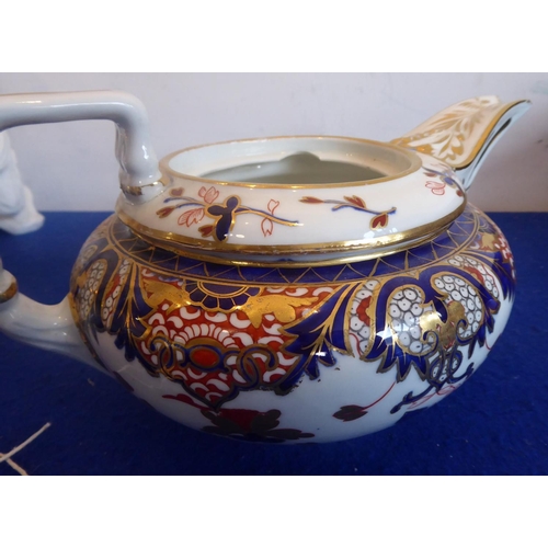 41 - A large early 19th Century Derby porcelain teapot hand gilded and decorated in the Imari palette tog... 