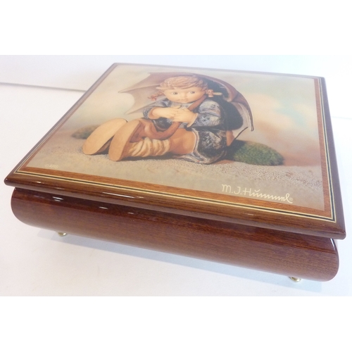 12 - A boxed M J Hummel music box crafted by Ercolano (handmade Italian inlaid woodwork)