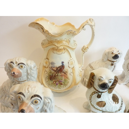 2 - Three pairs of hand-decorated Staffordshire spaniels together with a large Edwardian pitcher decorat... 