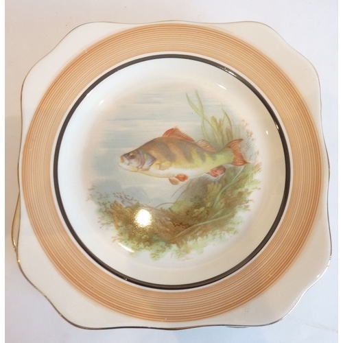 3 - A set of six mid-20th century side plates, each individually hand-decorated with a freshwater fish; ... 