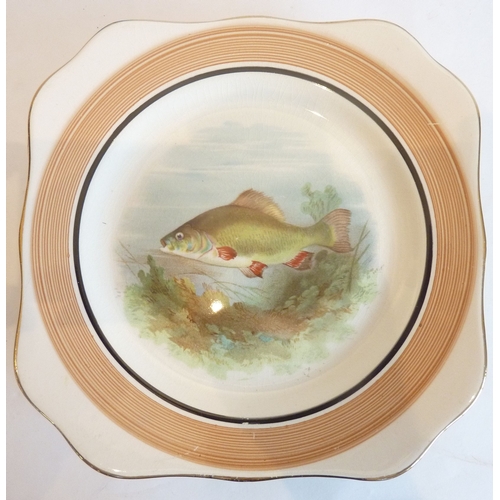 3 - A set of six mid-20th century side plates, each individually hand-decorated with a freshwater fish; ... 