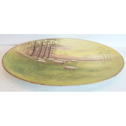 5 - A large late 19th / early 20th century oval ceramic platter; gilded rim and the whole of the surface... 