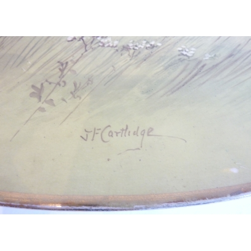 5 - A large late 19th / early 20th century oval ceramic platter; gilded rim and the whole of the surface... 