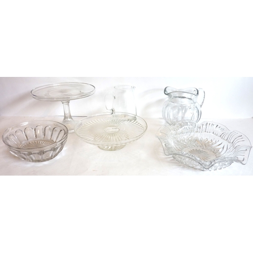 55 - An assortment of good quality glassware to include comports, dishes, a heavy water jug, and other si... 