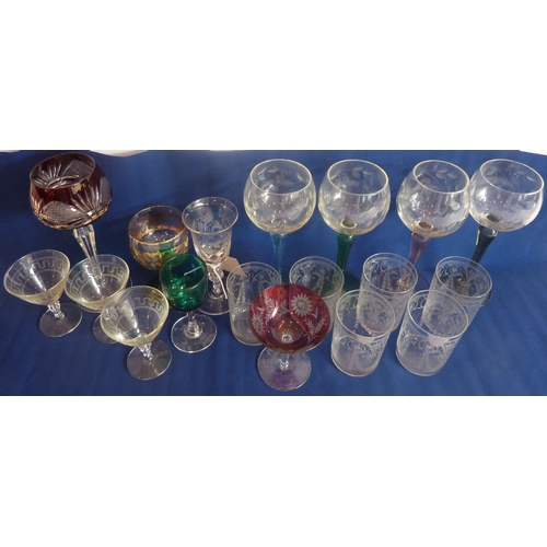 63 - A good selection of assorted drinking glasses to include engraved hock glasses, a small early 20th c... 