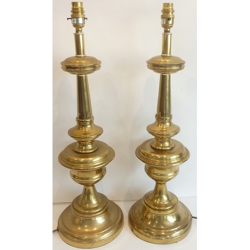 72 - A large pair of brass table lamps (67cm to top of fitting)